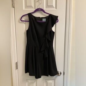 Black romper with ruffle detail size o